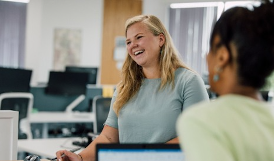 Image of a young professional smiling